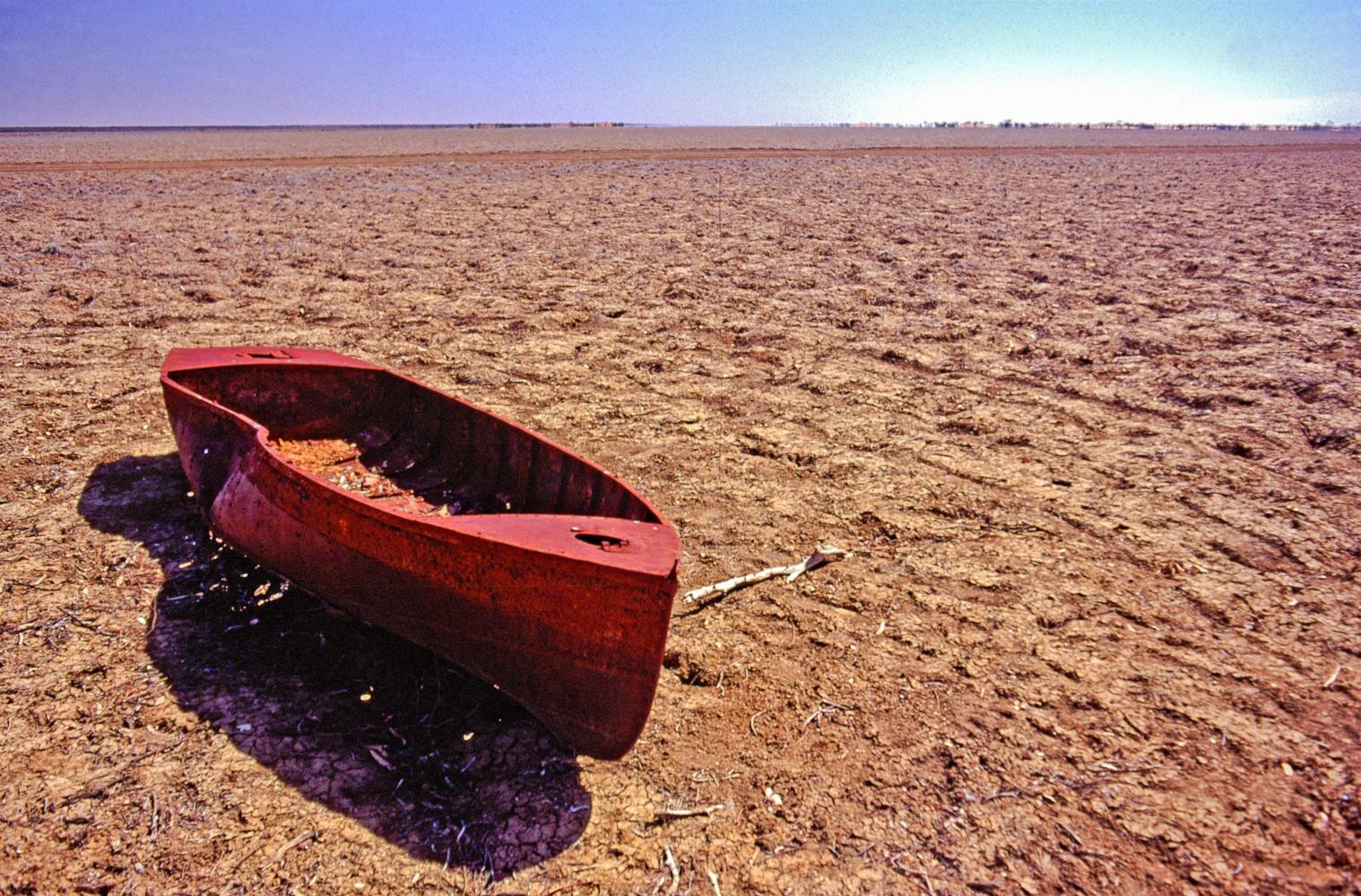 Old floodboat, near Windorah. Images such as this give clues to an unpredictable but central feature of the rivers of this area - their periodic flooding.